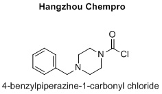 4-benzylpiperazine-1-carbonyl chloride